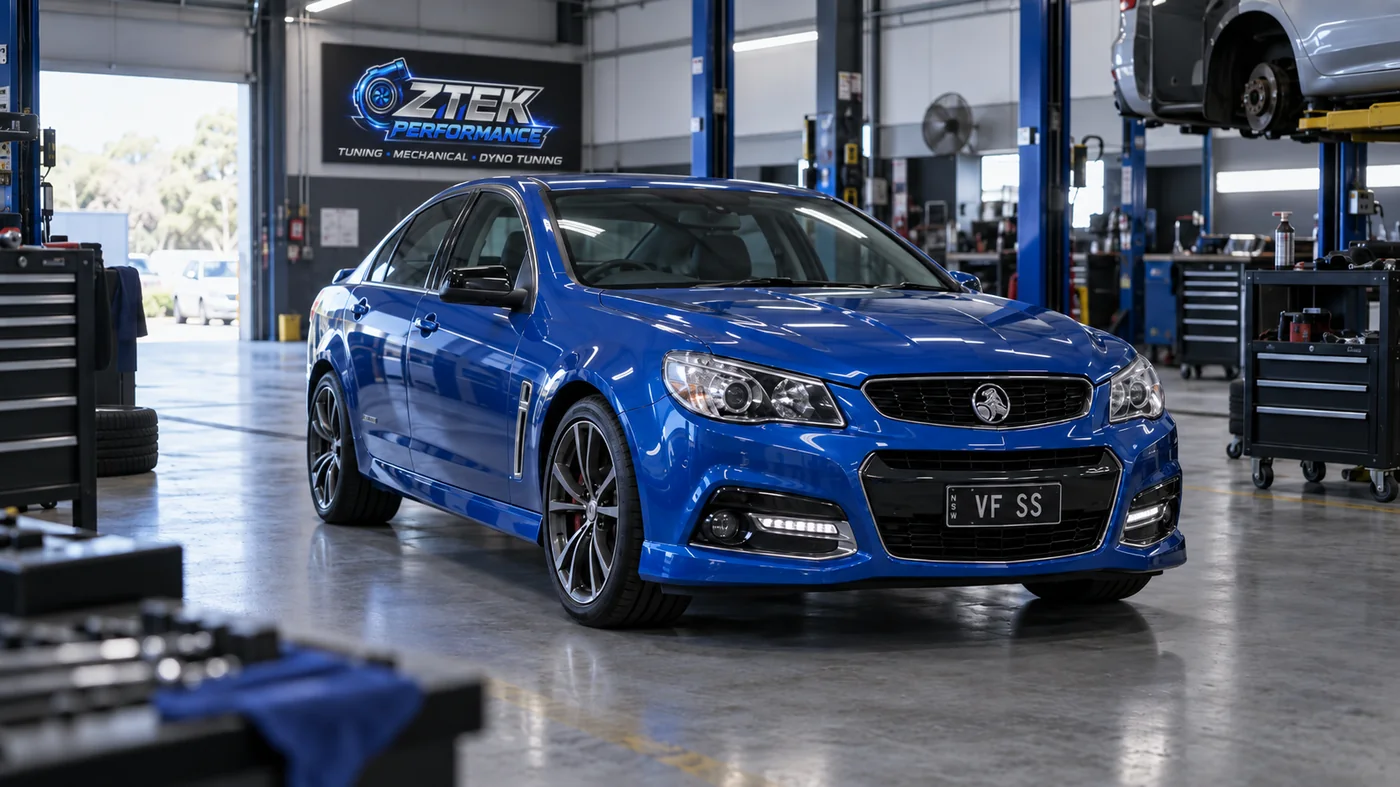 Blue VF SS Commodore in OZTEK workshop for servicing and mechanical work